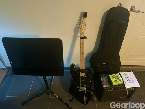 Elgitarr och förstärkare med tillbehör